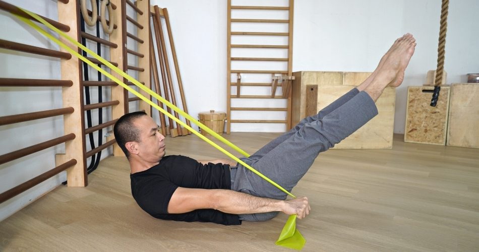 Michel demonstrating hundreds with elastic band
