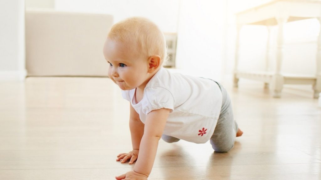 Baby crawling on the floor